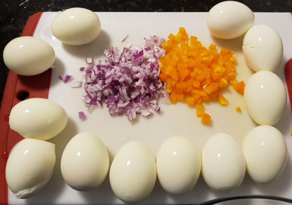A Dozen Eggs, Diced Red Onion and Diced Orange Pepper