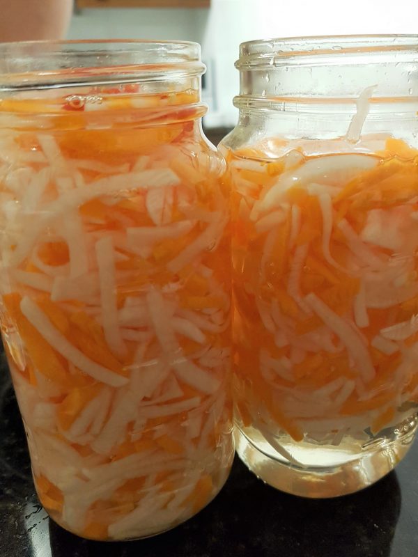 Daikon and Carrots in Pickle Brine in Mason Jars