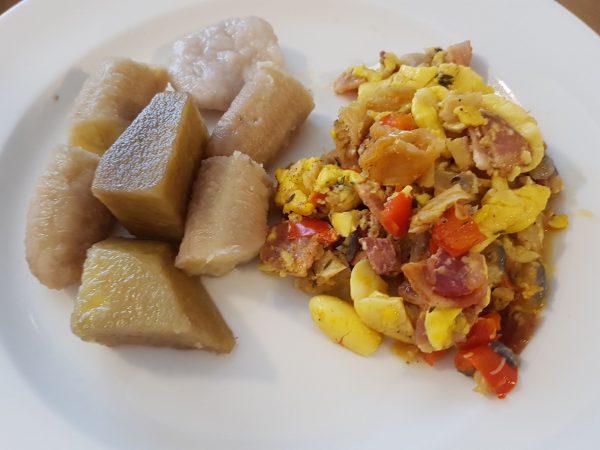 Ackee and Saltfish served with Boiled Yam, Green Banana and Dumpling